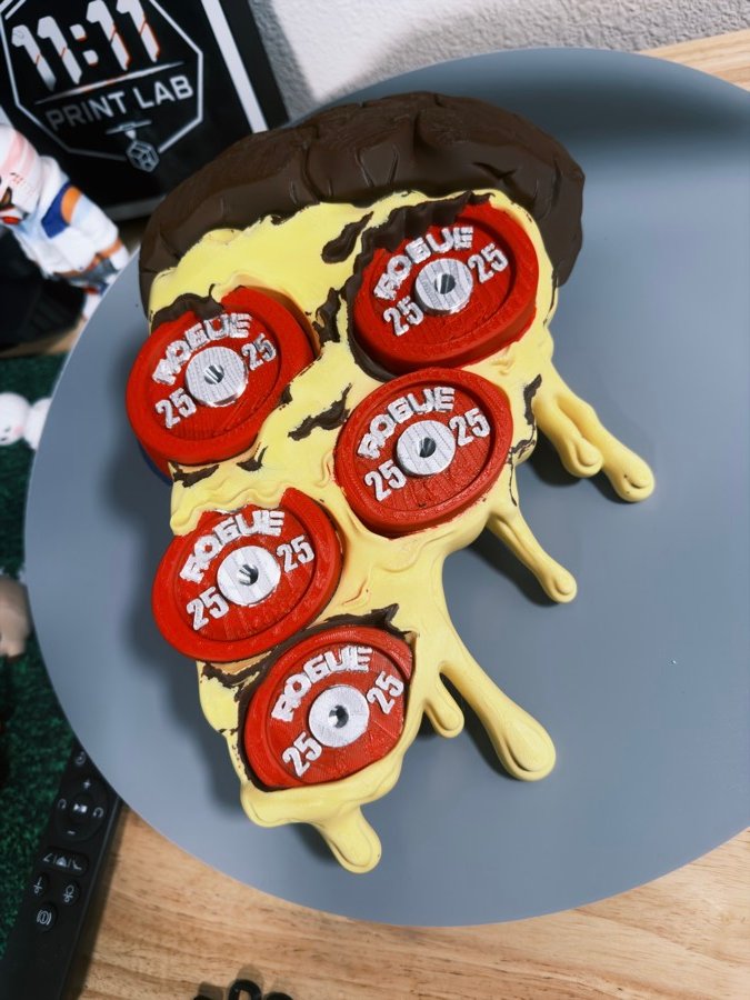 Pizza slice topped with red weight plates
