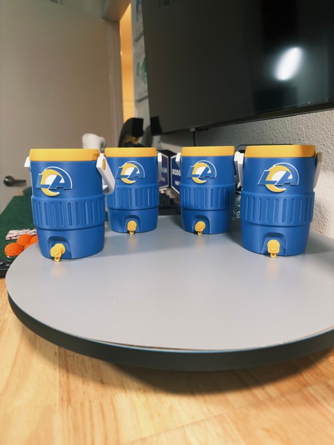 Set of four blue and yellow mini team coolers