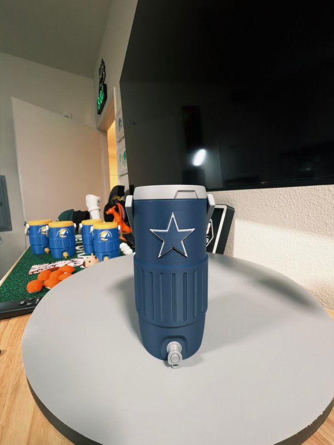 Navy mini team cooler with a star logo