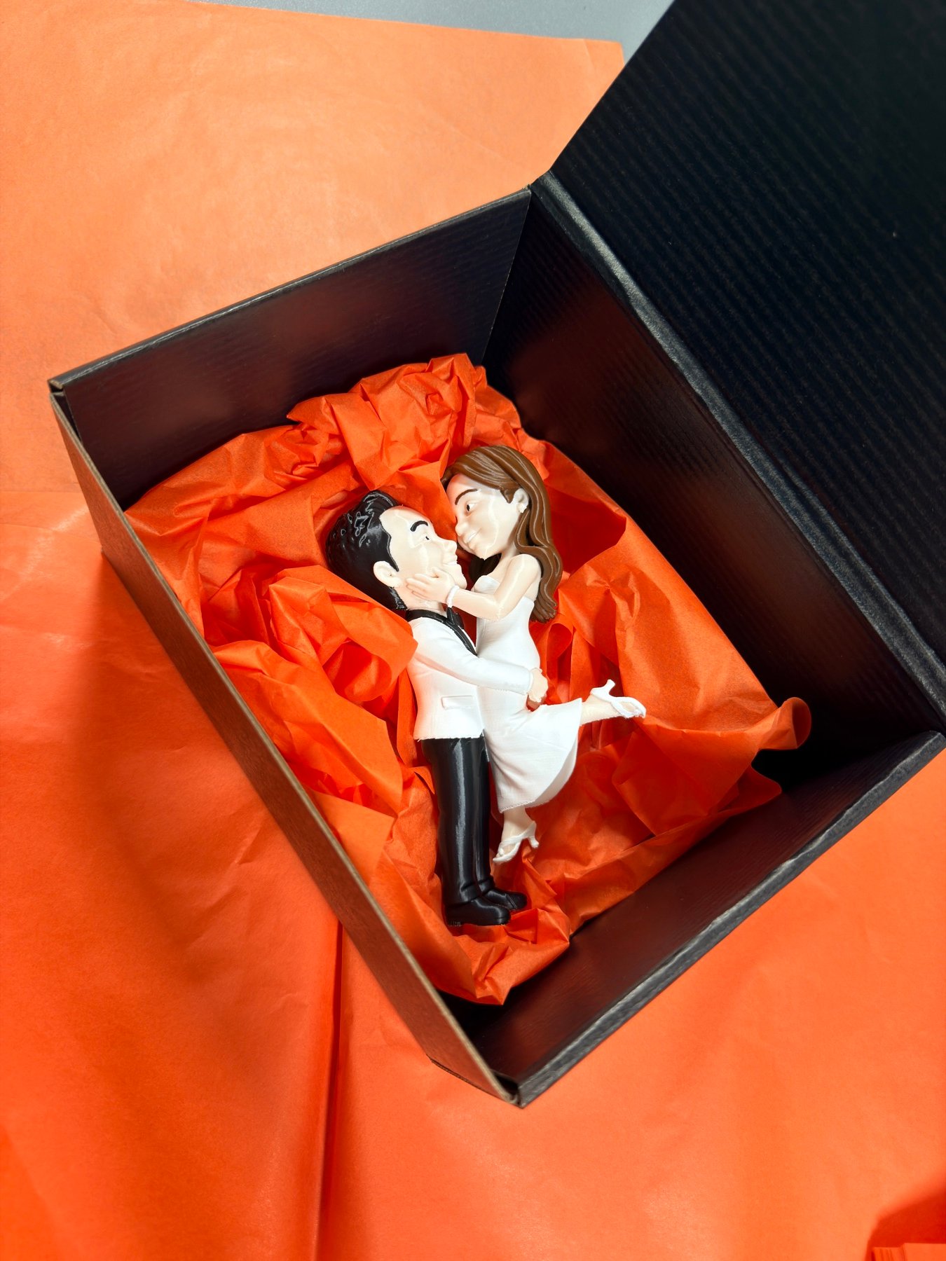 Custom wedding couple keepsake figure presented in a gift box